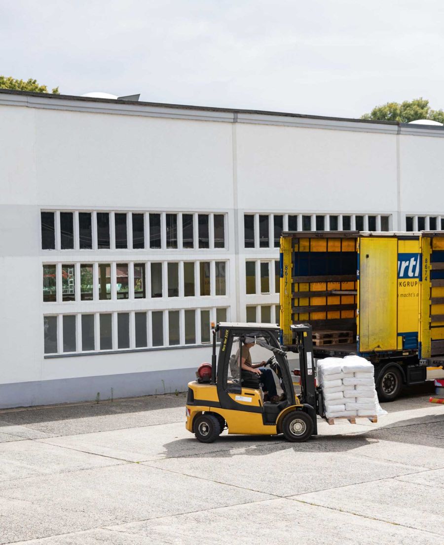 Image of a warehouse in Spremberg with forklift and truck